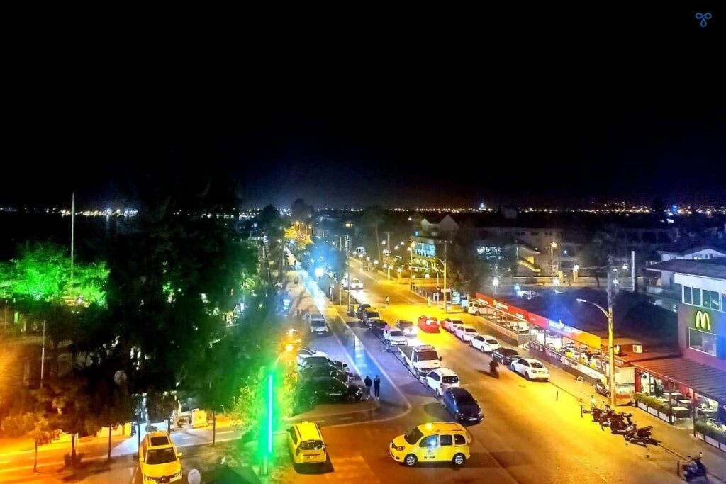 A nighttime view of a main road in Fethiye taken from the roof of Cafe Park Teras.