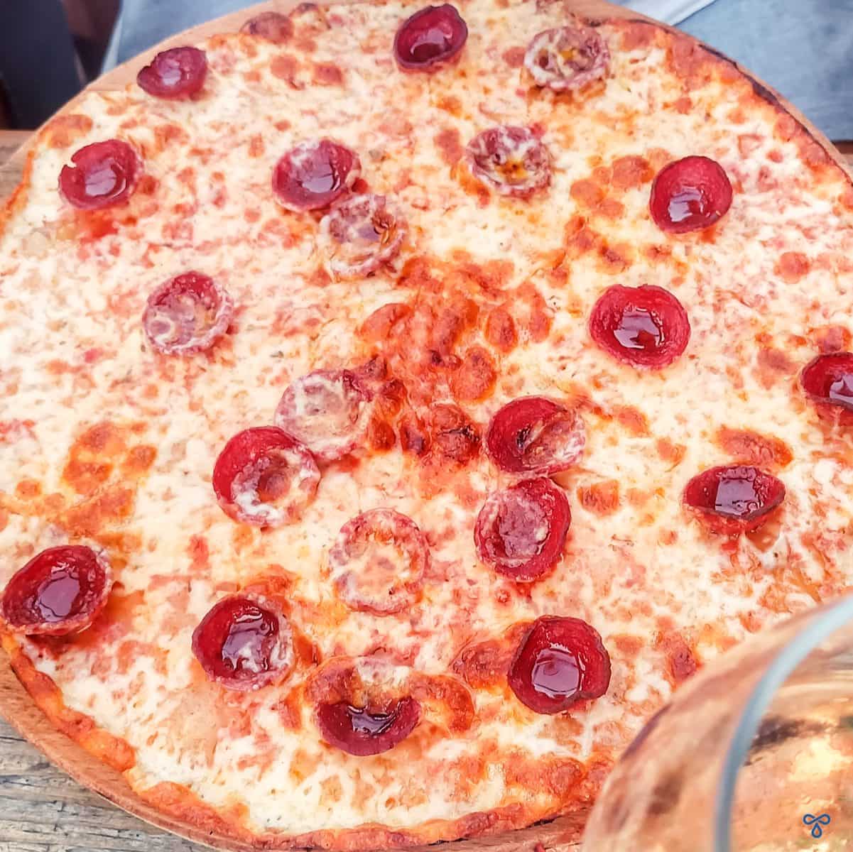 A pepperoni pizza photographed from above.