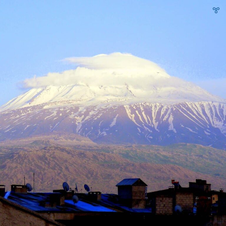 Snow capped Ararat Mountain towers over the rooftops