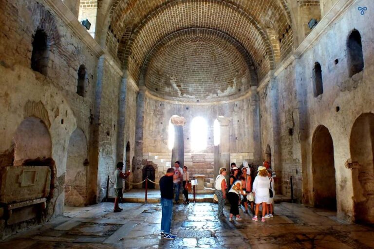 Interior Of St Nicholas Church, Demre. People are inside, taking photos.