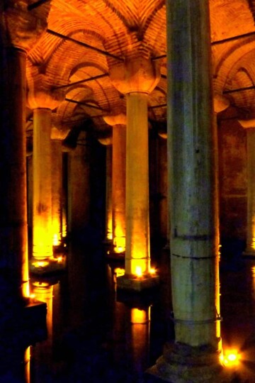 Symmetrical columns at the Basilica Cistern, Istanbul. The ceiling is arched and bricked.
