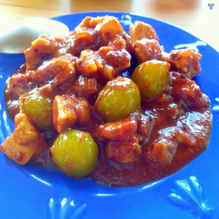 Fried greengage fruit in a sauce with chicken