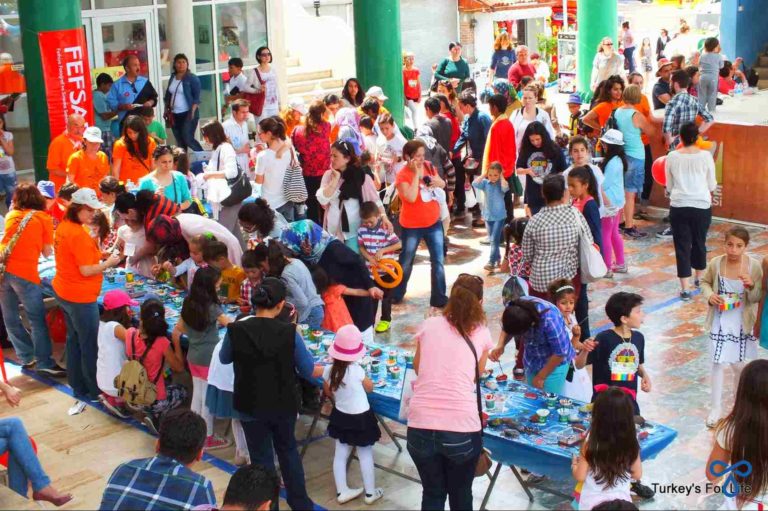 Children gathered for activities on Children's Day in Fethiye