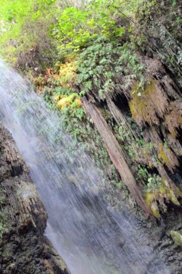 A diagonal shot of water tumbling at Gizlikent Waterfall
