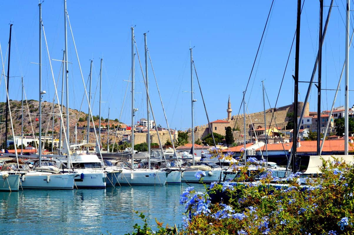 Yachts in &Ccedil;eşme Marina. The castle is in the background