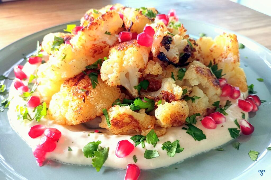 Roasted Cauliflower With Tahini Sauce & Pomegranate