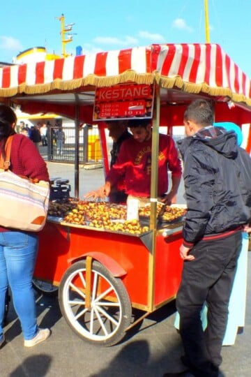 A red cart selling chestnuts in Istanbul.
