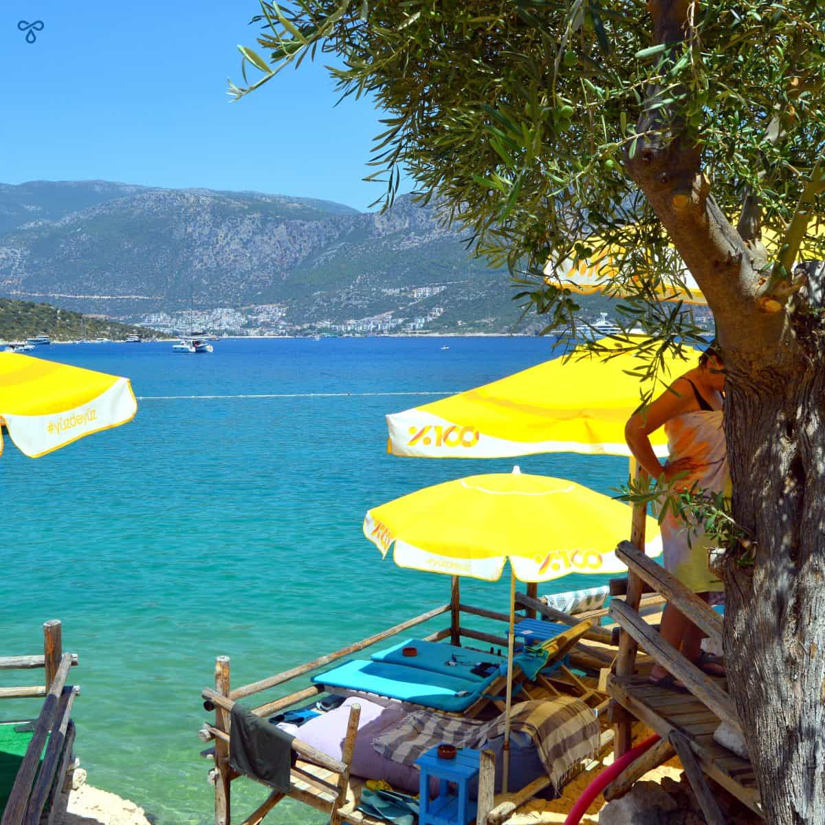 Wooden cabanas on a rock face over the sea at Limanağzı.