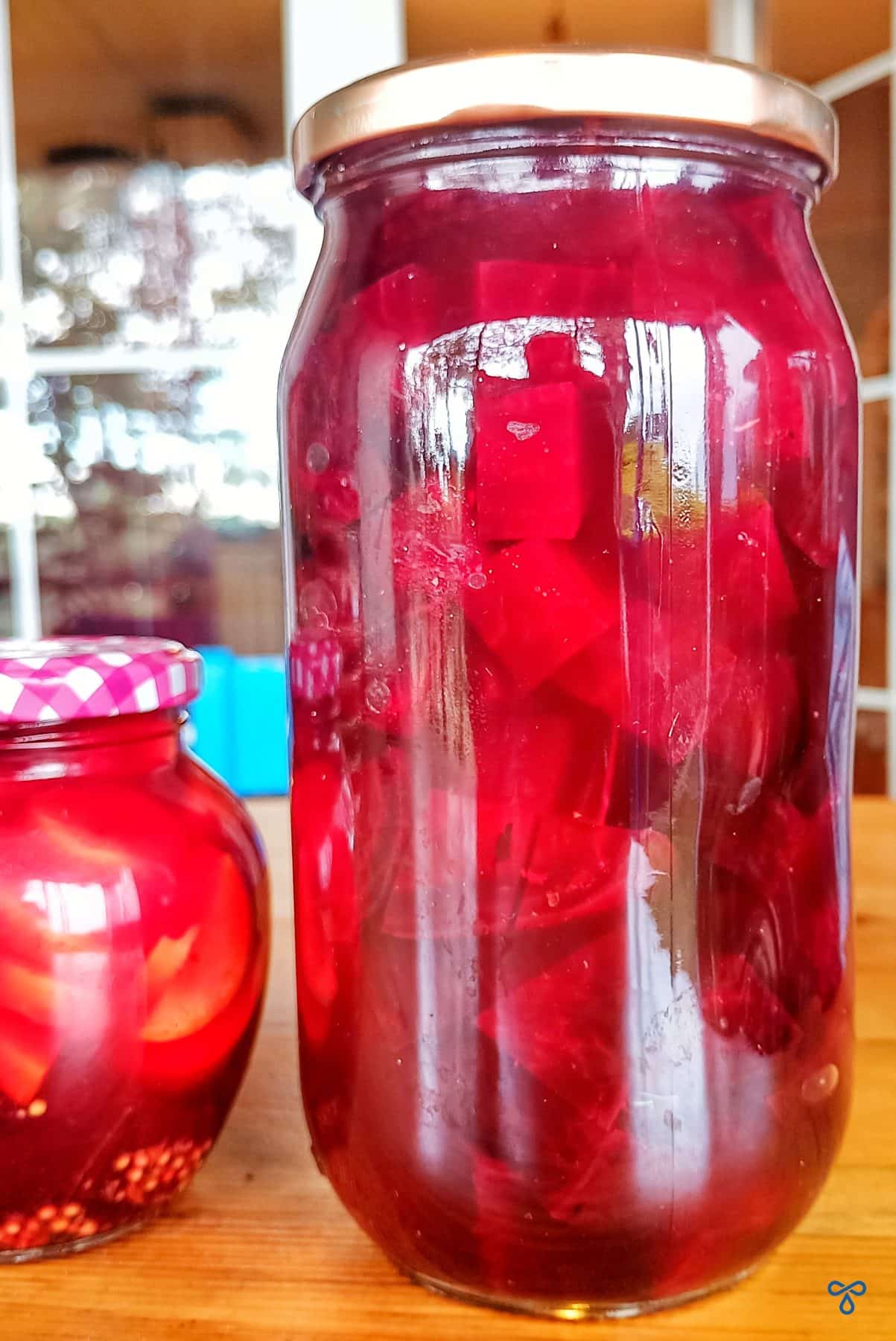 Pickled beetroot in a jar.